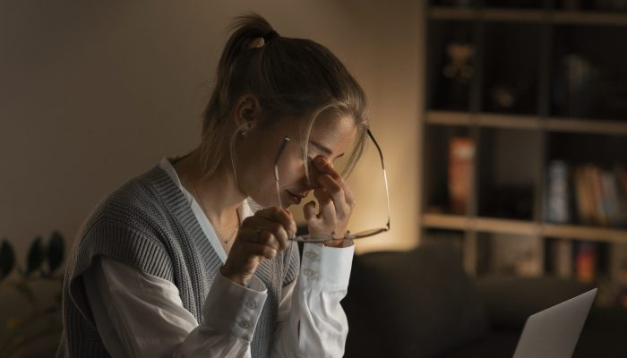 adult-person-working-home-computer-night