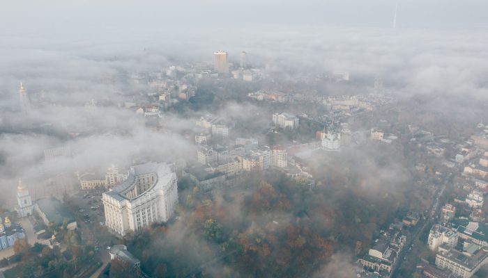 Aerial view of the city in the fog