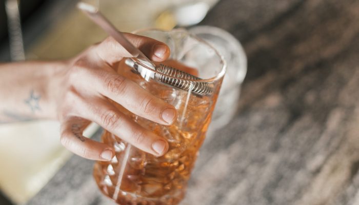bartender-preparing-refreshing-cocktail