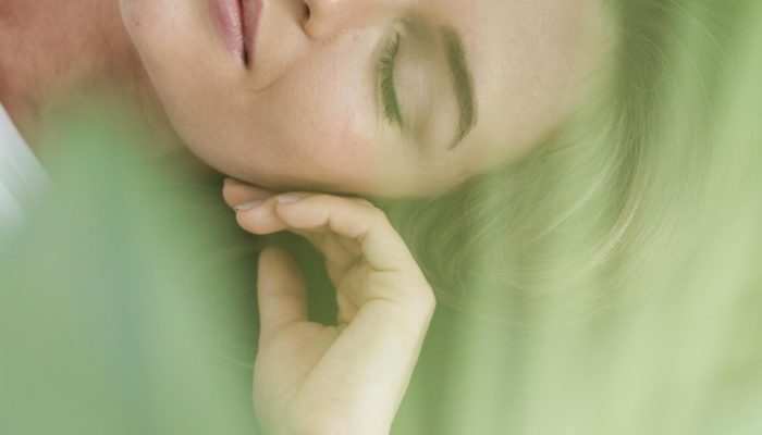 close-up-woman-green-plant