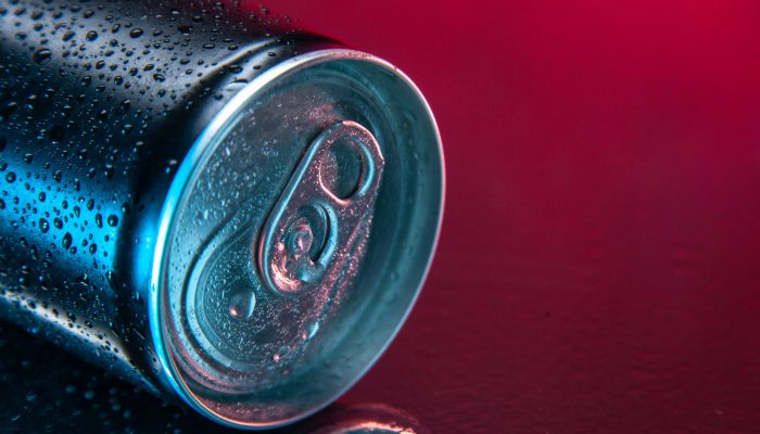 front-view-energy-drink-can-dark-pink-background-color-water-soda-darkness-drink