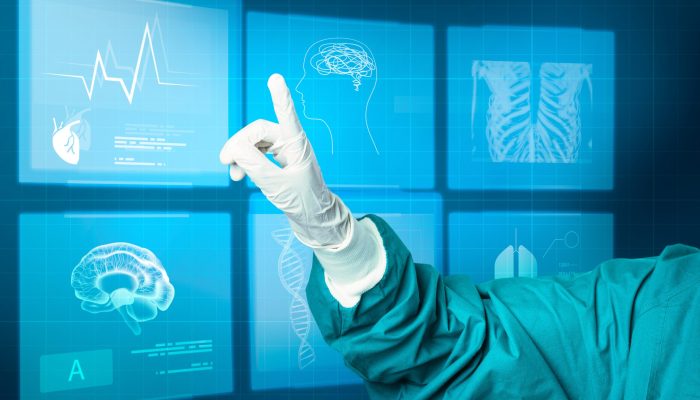 Hand in medical glove pointing to virtual screen medical technology