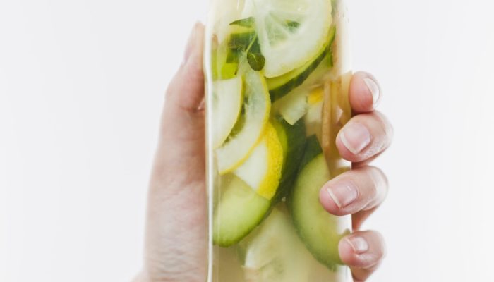 hand-with-bottle-fruit-lemonade