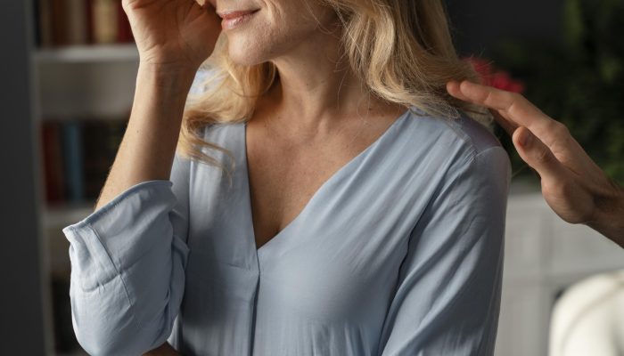 portrait-woman-being-comforted-therapy-office