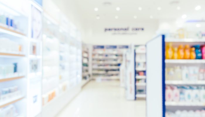 Abstract blur and defocused pharmacy and drug store interior for background