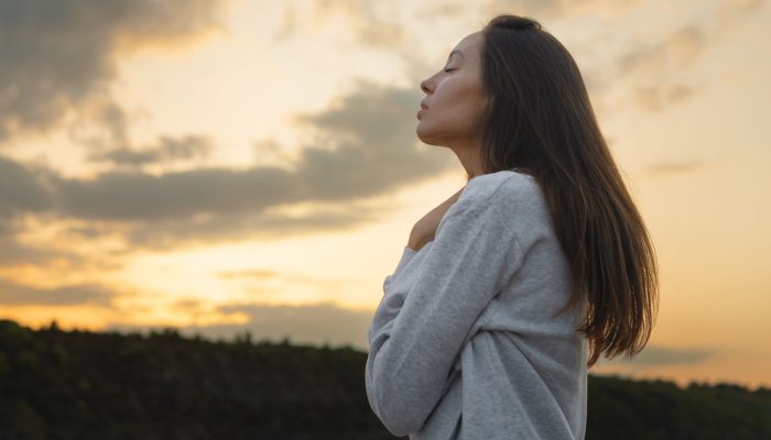 side-view-woman-standing-outdoors