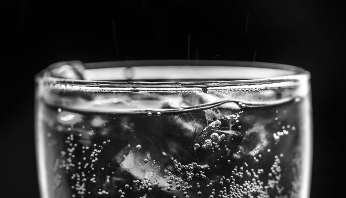 Soda with ice macro shot