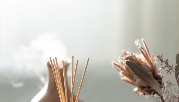 Spa composition with incense sticks, air humidifier and aroma oils. Aroma oil diffuser lamp with the stick perfume.