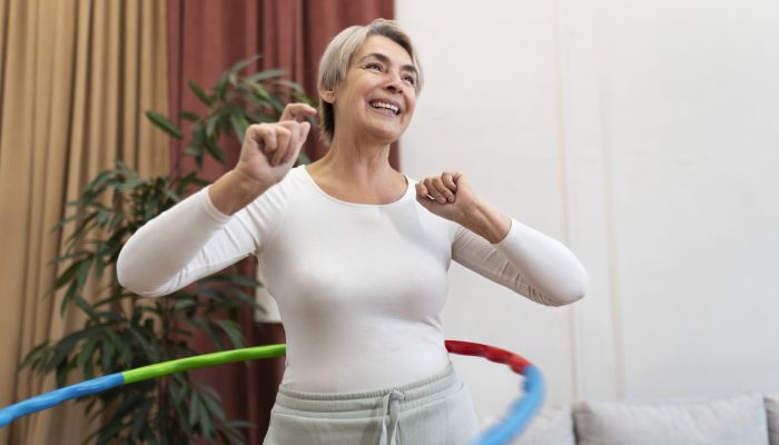 sport-person-training-with-hula-hoop