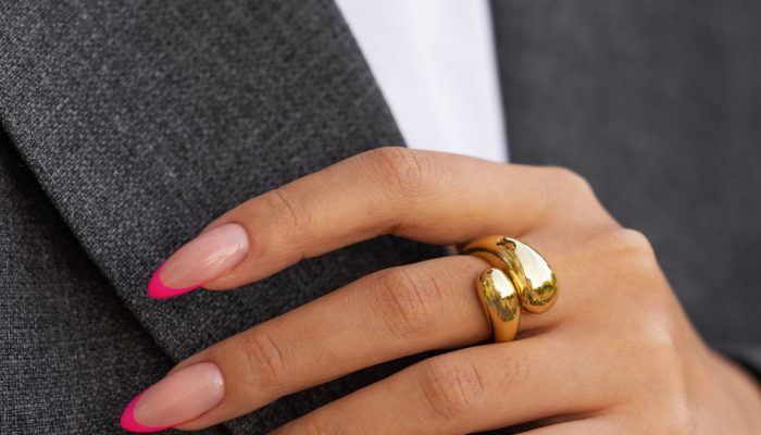 woman-showing-her-nail-art-fingernails