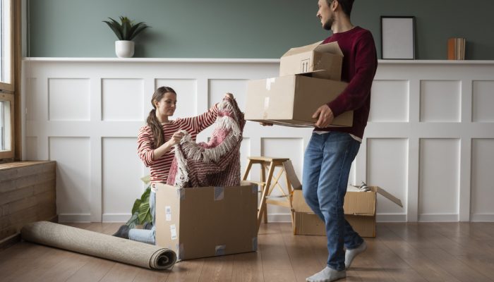 young-couple-moving-into-new-home