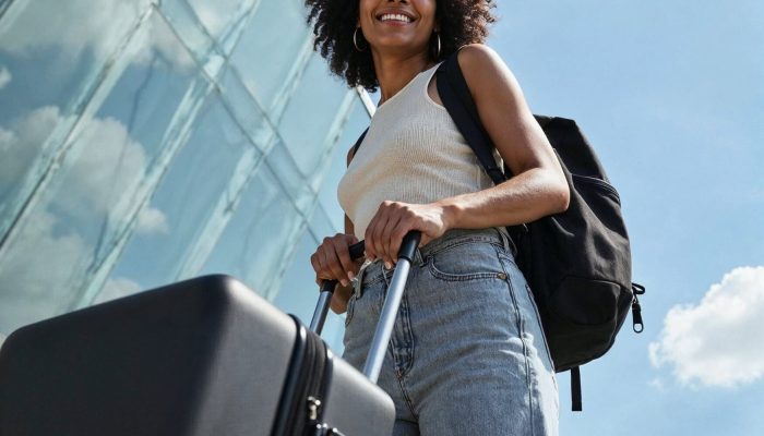 young-woman-traveling-with-suitcase